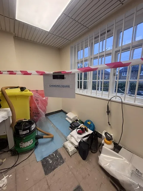 Asbestos floor tile and bitumen removal in Bethnal Green